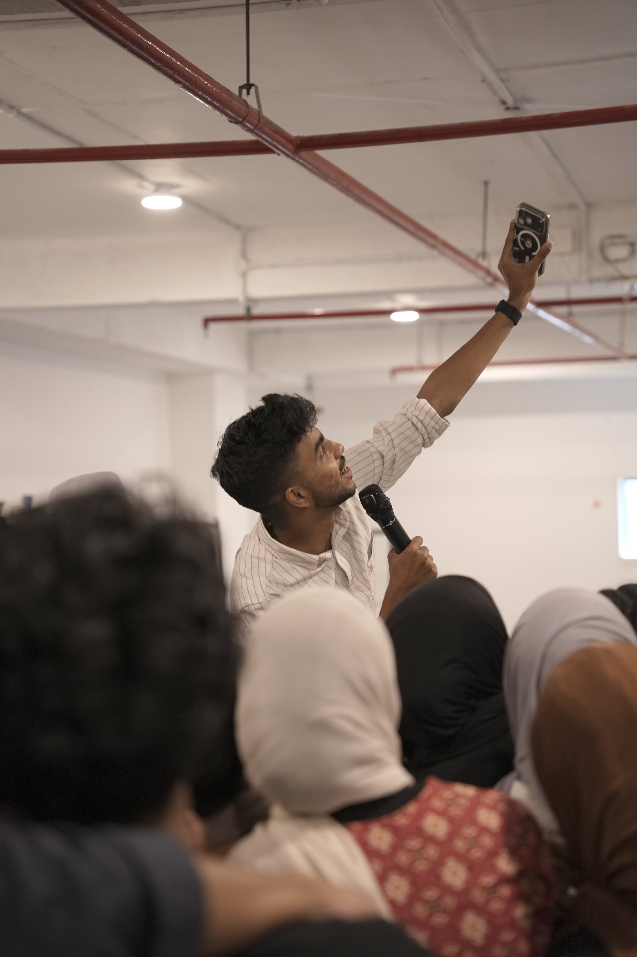 Muhammed Nazil K speaking to students at a workshop