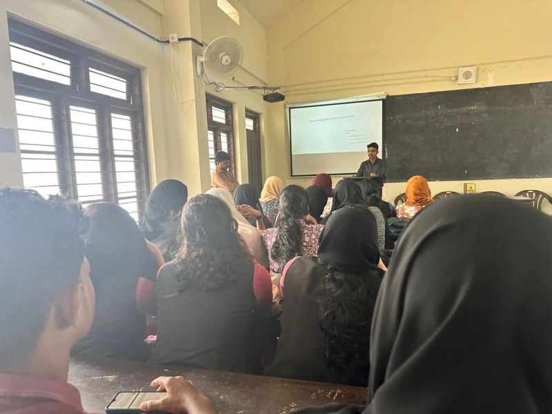 Muhammed Nazil K presenting a session in a college classroom